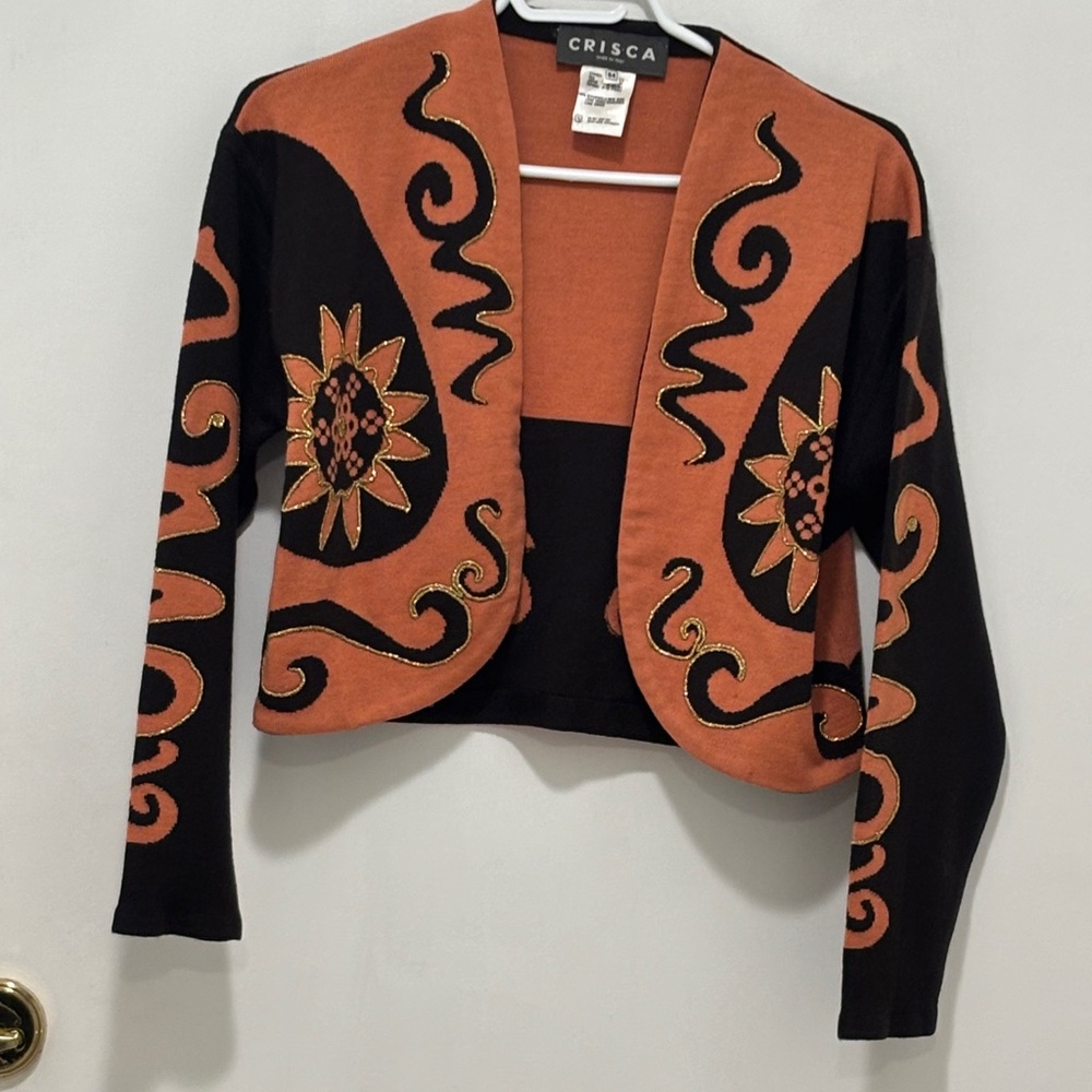 CRISCA Black and Orange Cardigan with Floral Design. 100% wool. Size 34